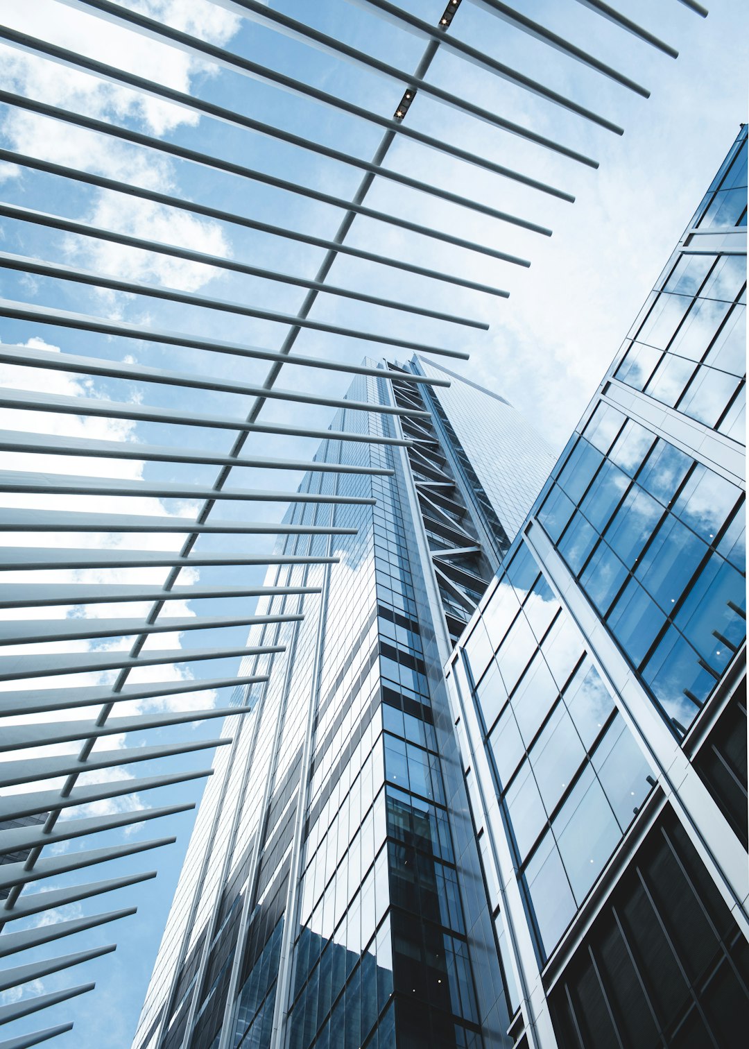 a-tall-building-with-many-windows-and-a-sky-background-yakr8nalzcy